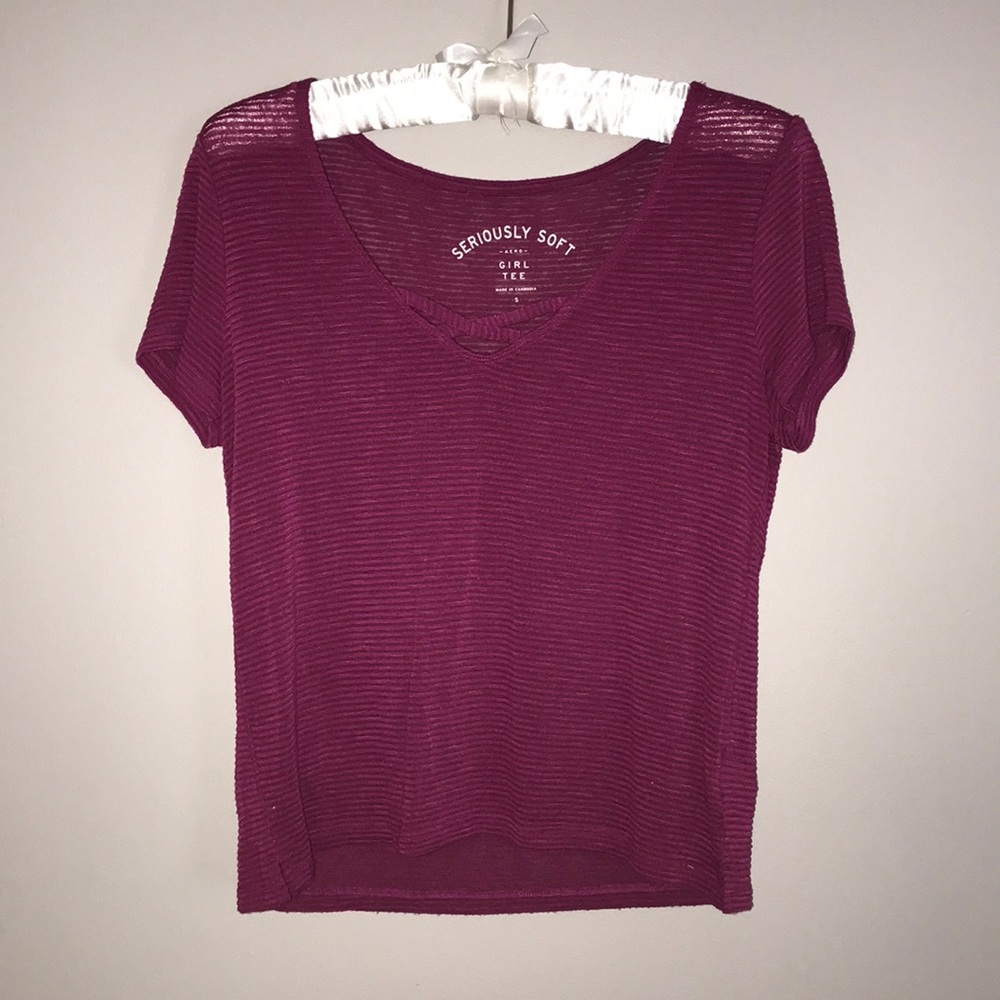 Dark pink, striped shirt